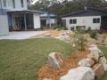 Seamist Close Murrays Beach Project Excavations & Levelling, Sandstone Boulder Walls, Charcoal Paving, Timber & Sandstone Steps, Lawns, Gardens & Decorative Gravels